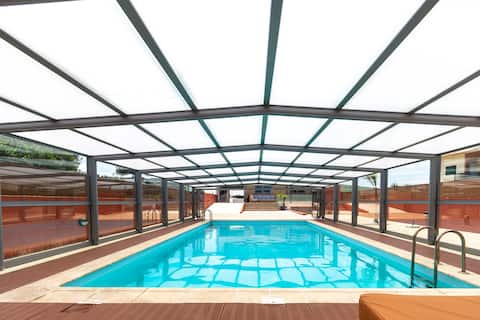 House with heated pool all year round.