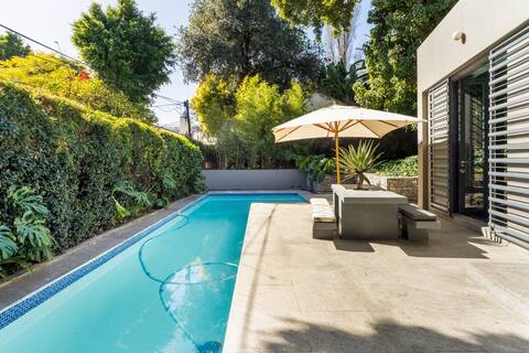 Designer two bedroom home with pool and rooftop