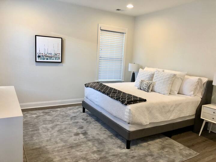 Master Bedroom 2 - King bed, walk-in closet, on-suite bathroom.