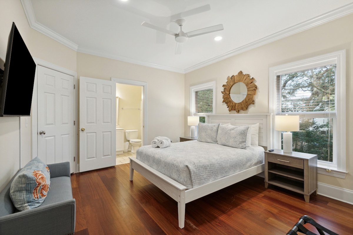 the room with a private bath, queen bed, TV, and large closet is a great choice for travelers who want a little extra space and privacy during their stay. The room is comfortable,l and functional.