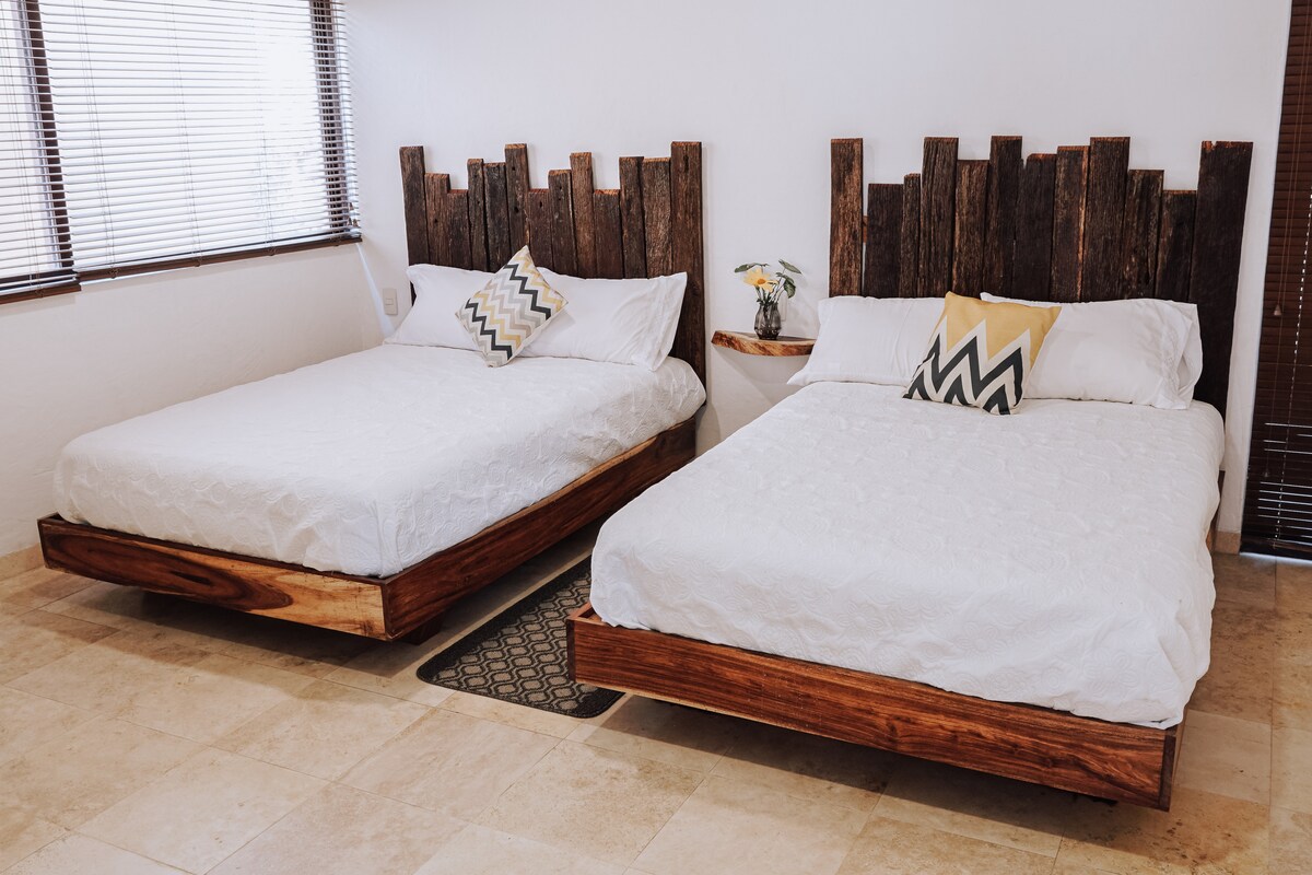 Bedroom 2:
Find in this bedroom an ideal atmosphere to rest (2 double beds).