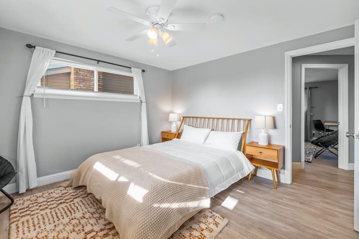 Bedroom #2 - Queen bed (Zinus memory foam), two nightstands with lamps, lounge chair, work desk, luggage rack, humidifier, fan, clothes hangers. 