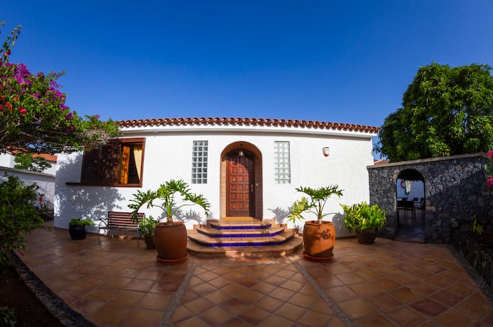 White-washed villa facade and entrance