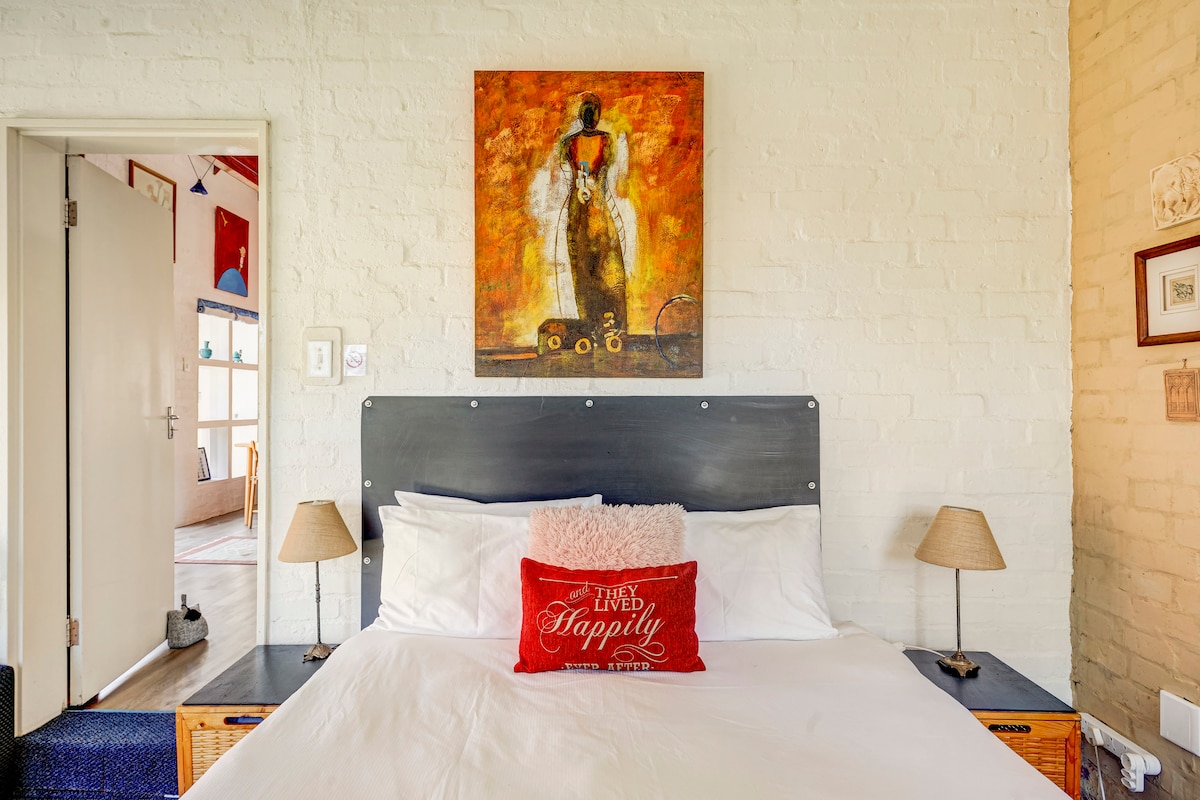 The Garden Room is popular with guests who enjoy waking up early and opening the sliding doors to listen to the birds in the garden.