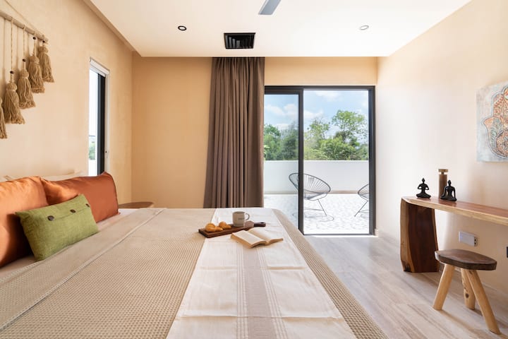 Room 3  on the first floor. King bed and balcony.