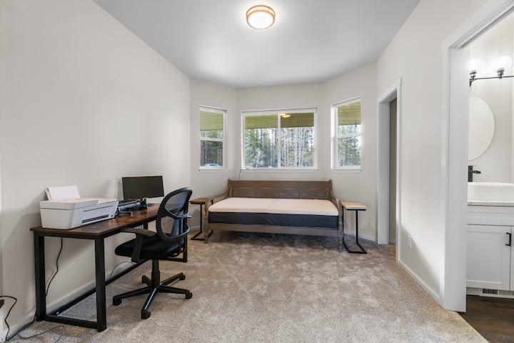 Twin bed room, working desk and half bathroom