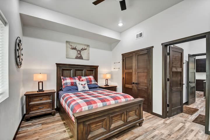 Main level bedroom with Queen bed.