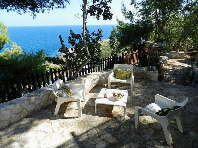 House with garden and panoramic sea views