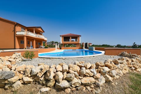 Popular Airbnb listing: Sea view apartment with large pool & ocean breeze in Grbe