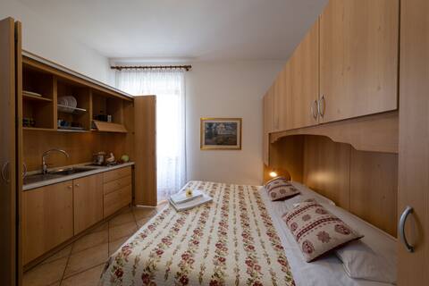 Room with kitchenette Trentino card as a gift