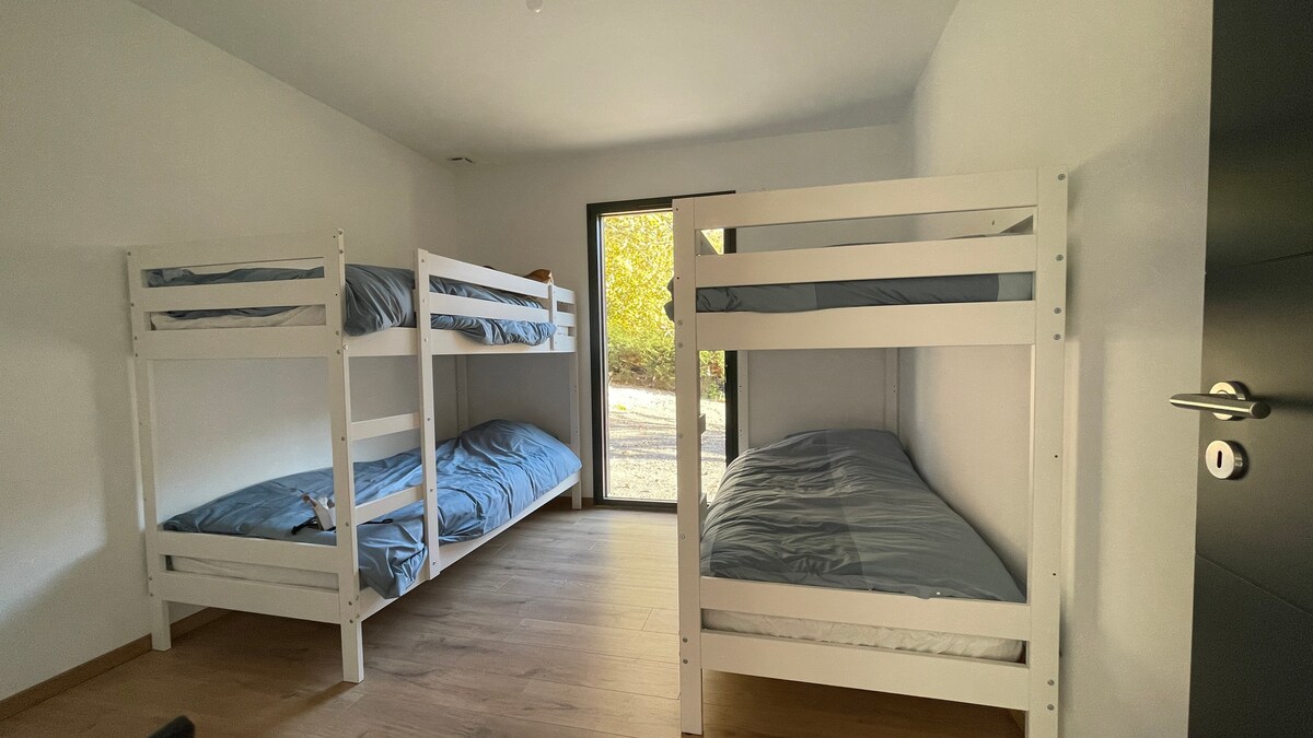 dorm room with two bunk beds