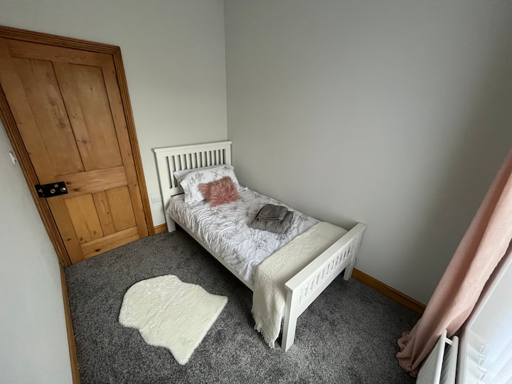 The single room at the rear of the property