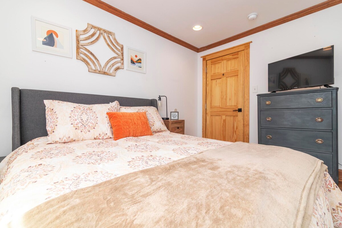 Charming and comfortable, this bedroom is perfect for guests seeking a peaceful haven.