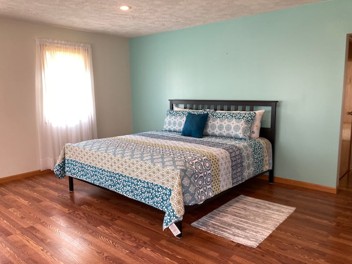 Large Master Bedroom with King Bed and En Suite Bathroom