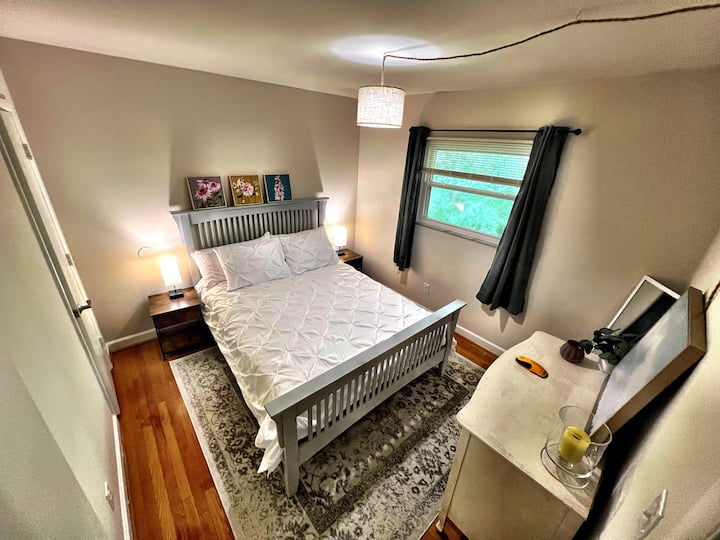 Bedroom 2 has a Queen size hybrid bamboo charcoal and aloe vera infused memory foam mattress, large closet, standing mirror and blackout curtains.

Table lamps with USB charging port &  power outlet for charging devices.