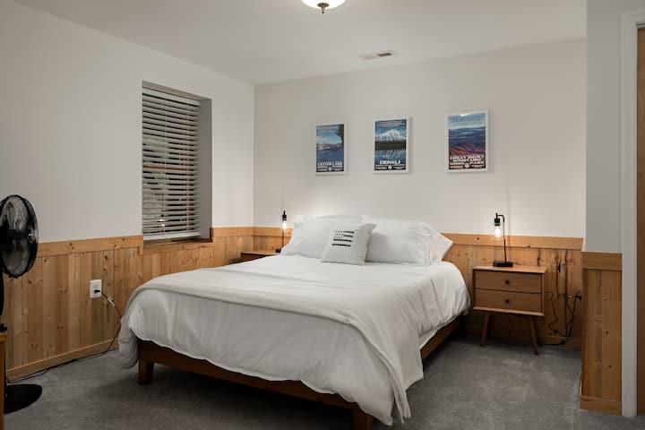 One of our four bedrooms with a queen bed and a bunk bed (two twins). 