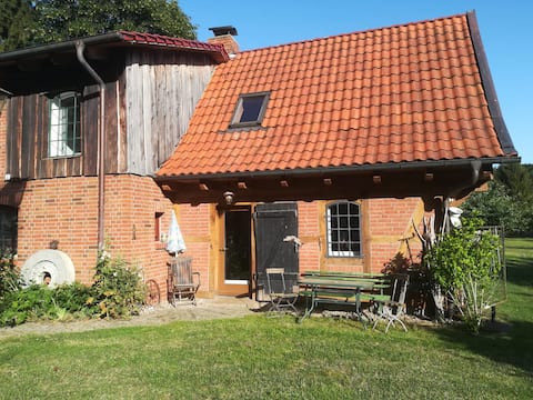 Top Airbnb: Cozy house with fireplace quietly located in the forest in Nordwestmecklenburg