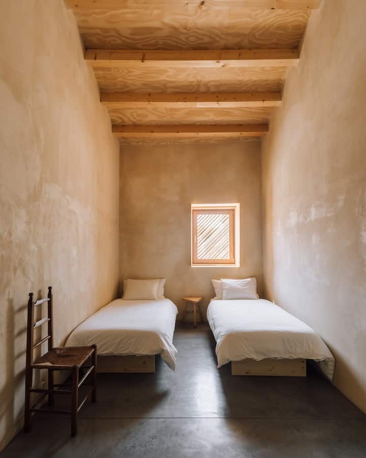 Bedroom 2 with two single beds (which can be put together in the center to make a king-size double bed).