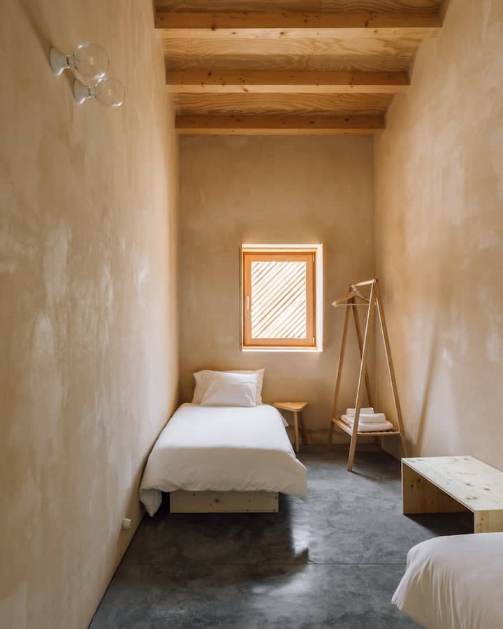 Bedroom 3 with two single beds.