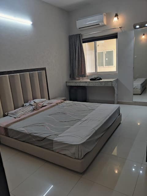 Newly furnished private bedroom in a 3BHK flat.