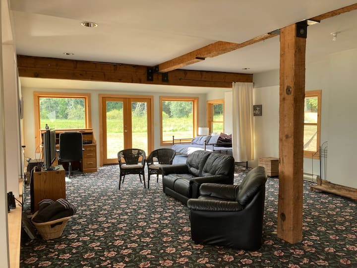 This is the TV area.  We have VHS videos for the kids (and adults), no cable.  You can see how the bed is in the corner of the lower floor.