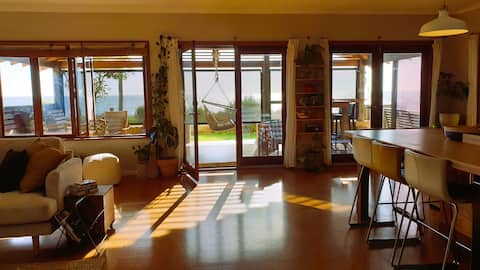 "On The Beach" Relaxed ocean-side living.