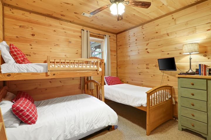 Downstairs bedroom that is perfect for both kids and adults! There is a full bathroom directly next to this downstairs bedroom.
