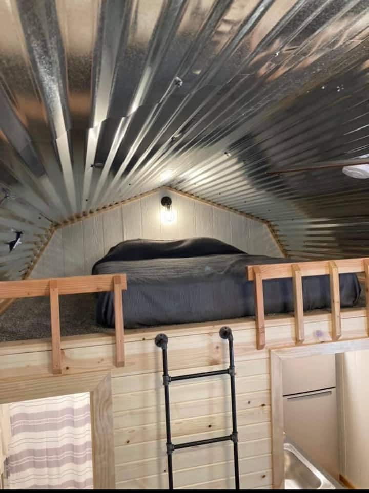 Lofted Queen bed on both sides of the cabin. You do have to climb a ladder to get up into the beds.