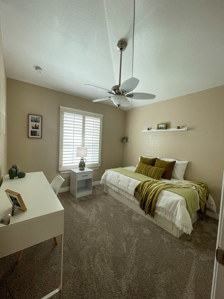 Upstairs the Cactus Room awaits! Featuring a twin bed (convertible to king), work desk, closet, and cactus decor that exudes tranquility. Mirror and USB nightstand for your convenience. Ideal for 2 guests.