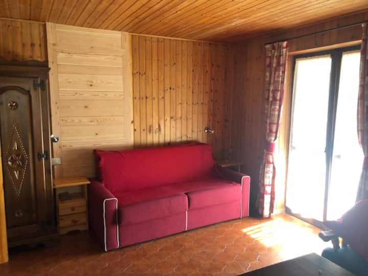 sala de estar y sofá cama doble