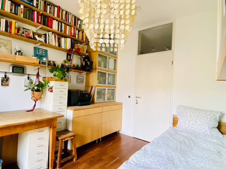 ห้องนอนพร้อมเตียงเดี่ยวและทางไประเบียง 2
