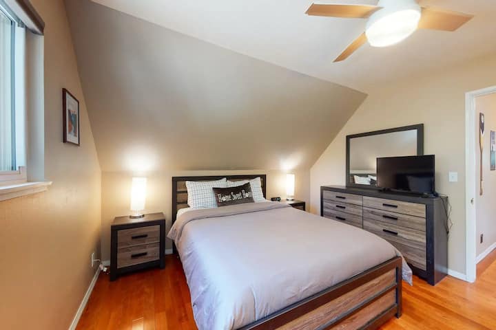 One of two bedrooms on second level. The bedroom comes furnished with queen bed and smart TV.