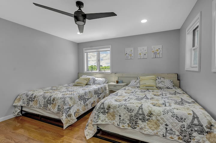 Bedroom 3 - the yellow room with 2 queen size beds and closet space. 