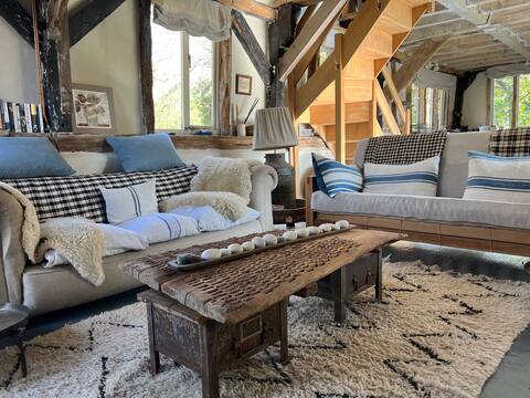 Popular Airbnb listing: Original open plan cartshed overlooking garden in East Hampshire