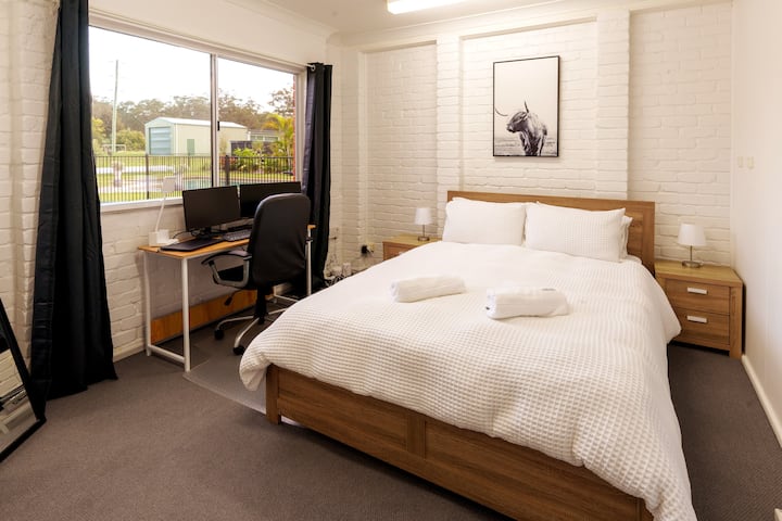 Work from home anyone? 5th bedroom with the study/work space.

This bedroom adjoins to the games room and has its own bathroom and toilet. 

The view overlooks the pool and garden area of the backyard.