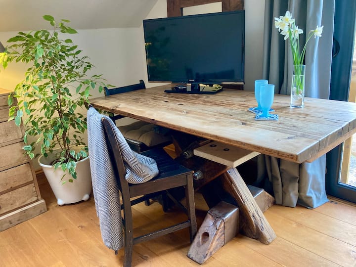 Handmade table, constructed from marble and railway sleepers. Perfect for eating or working at, or playing board games on. 