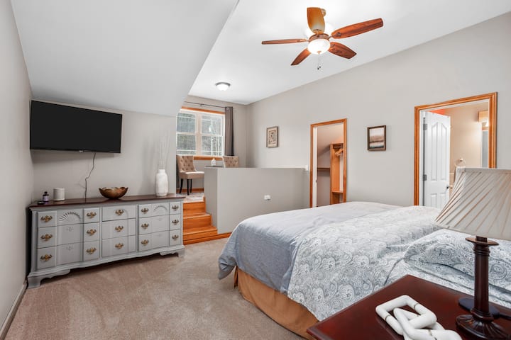 Master Bedroom w/ cozy sitting area.