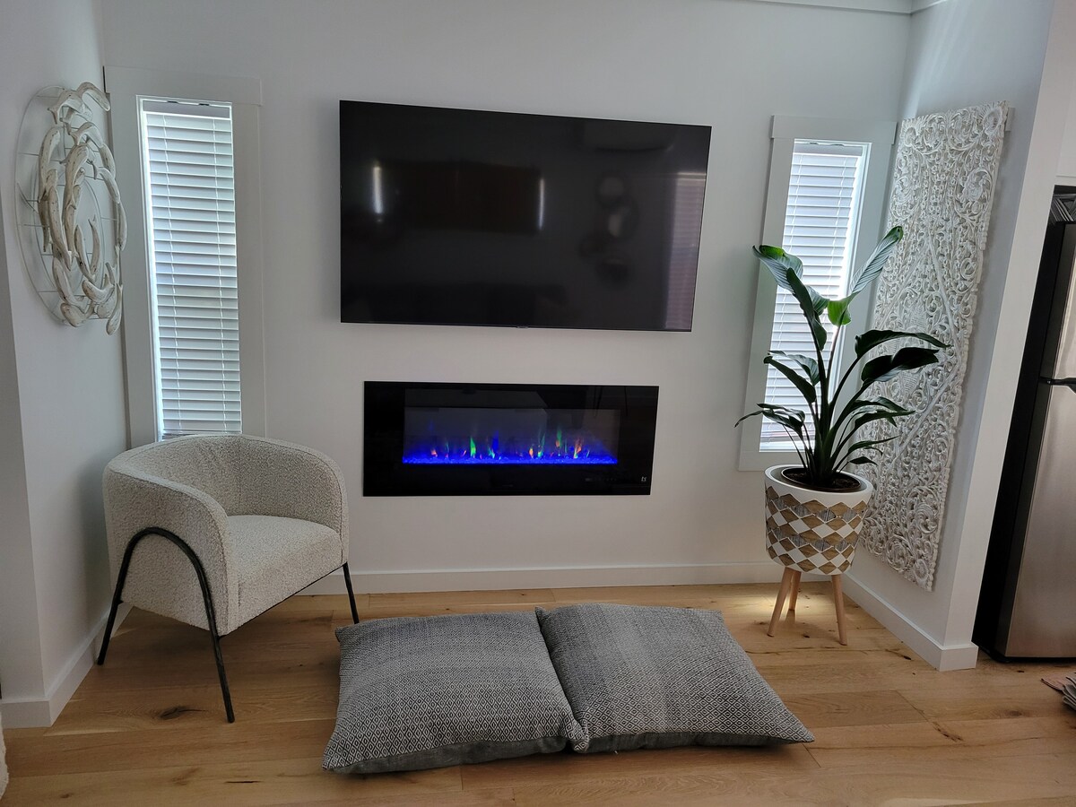 65 inch Smart TV & electric fireplace at Juan Love in Santa Rosa Beach