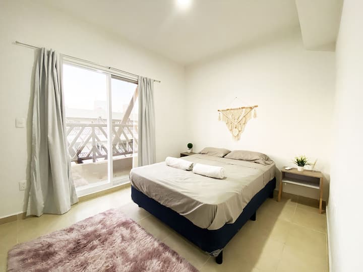 The main bedroom with double bed, closet and air conditioning
