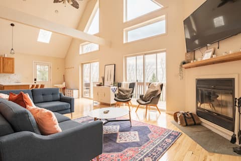 Bright A-frame nestled against 700 acres of forest