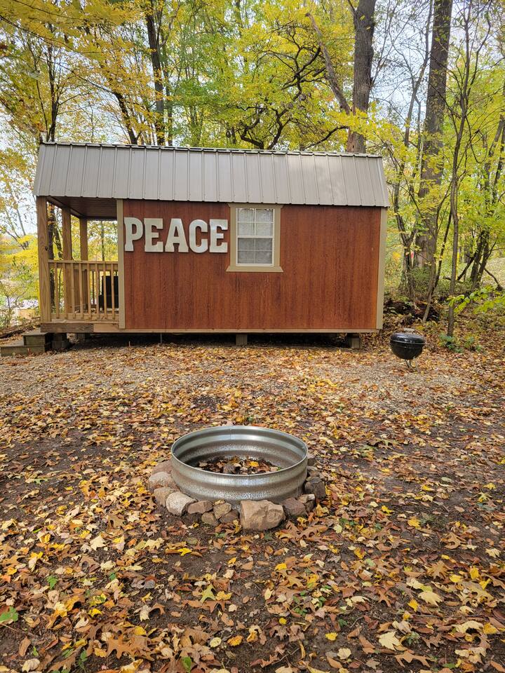 Cabins at Rainbow Farms tiny cozy "Peace" cabin Tiny houses for Rent