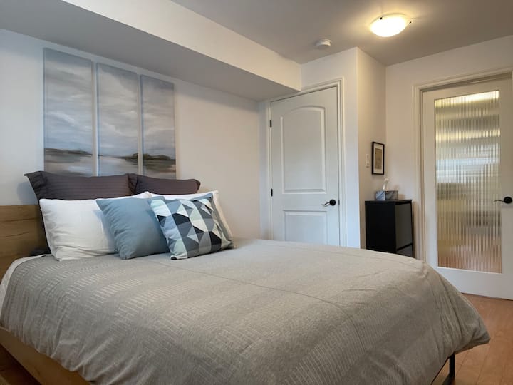 The separate bedroom offers a closet and bright south facing window with California shutters for room darkening sleeping. 