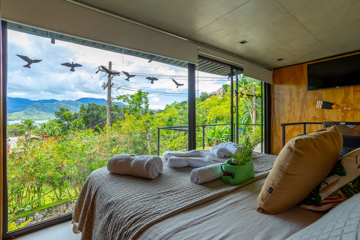 Bedroom at Casa Natu Ilhabela Studio Feiticeira with Jacuzzi in Ilhabela