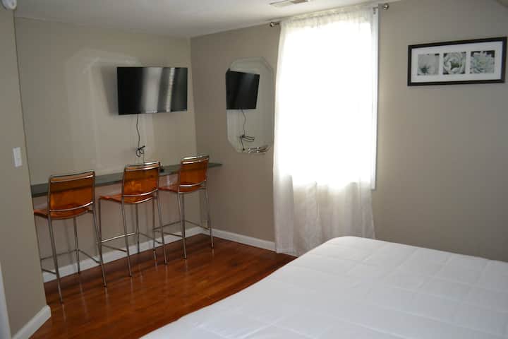 King Bed #2 upstairs with area for getting ready for a night out!