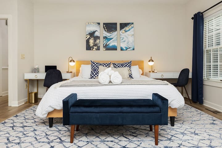 Lay your head down in the King-size master bedroom with memory foam mattress and two desks