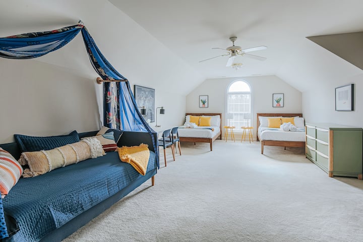 Retreat to the upstairs bedroom - the only room on an upper floor. It includes two full-size beds, double desk, and a cozy daybed to watch a movie or snuggle up with a good book. This is a favorite room with the kids!