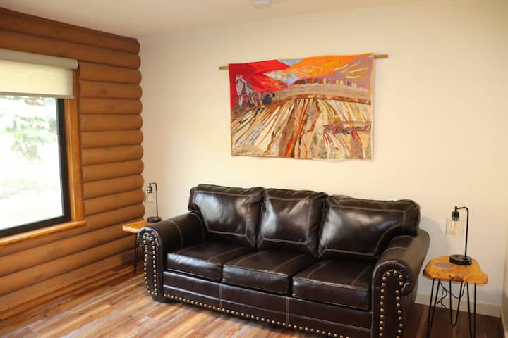 This room is made private with barn doors.  It is used as a second living room or fourth bedroom with a pull-out queen sofa sleeper.  It includes a full-size armoire. 
