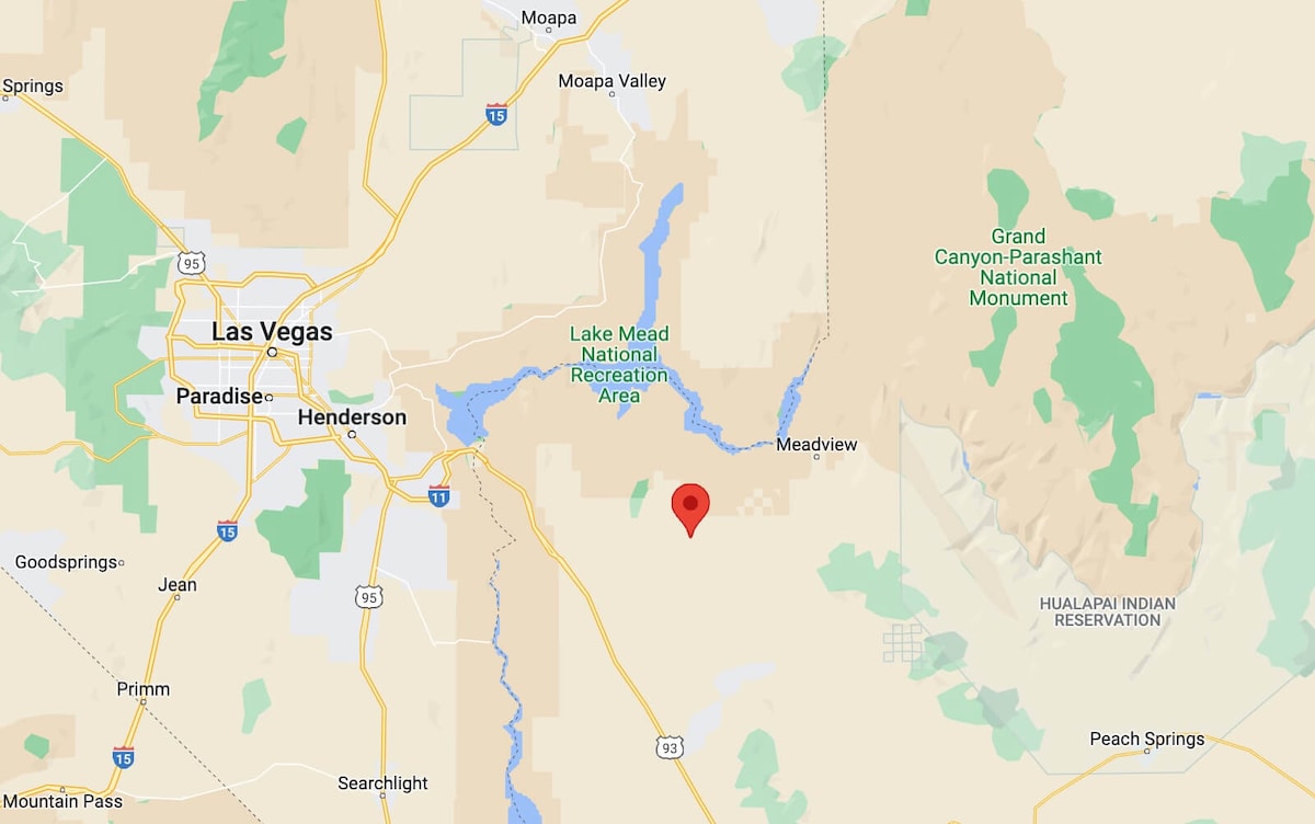 A map highlighting the property's location in relation to nearby attractions, including Las Vegas to the west and the Grand Canyon Skywalk to the east. The area surrounding the property is characterized by varied terrain, including expansive natural landscapes and proximity to Lake Mead.