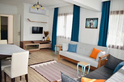 Popular Airbnb listing: Ozalphomes - 2+1 house with sea view in the center of Datça. in Datça