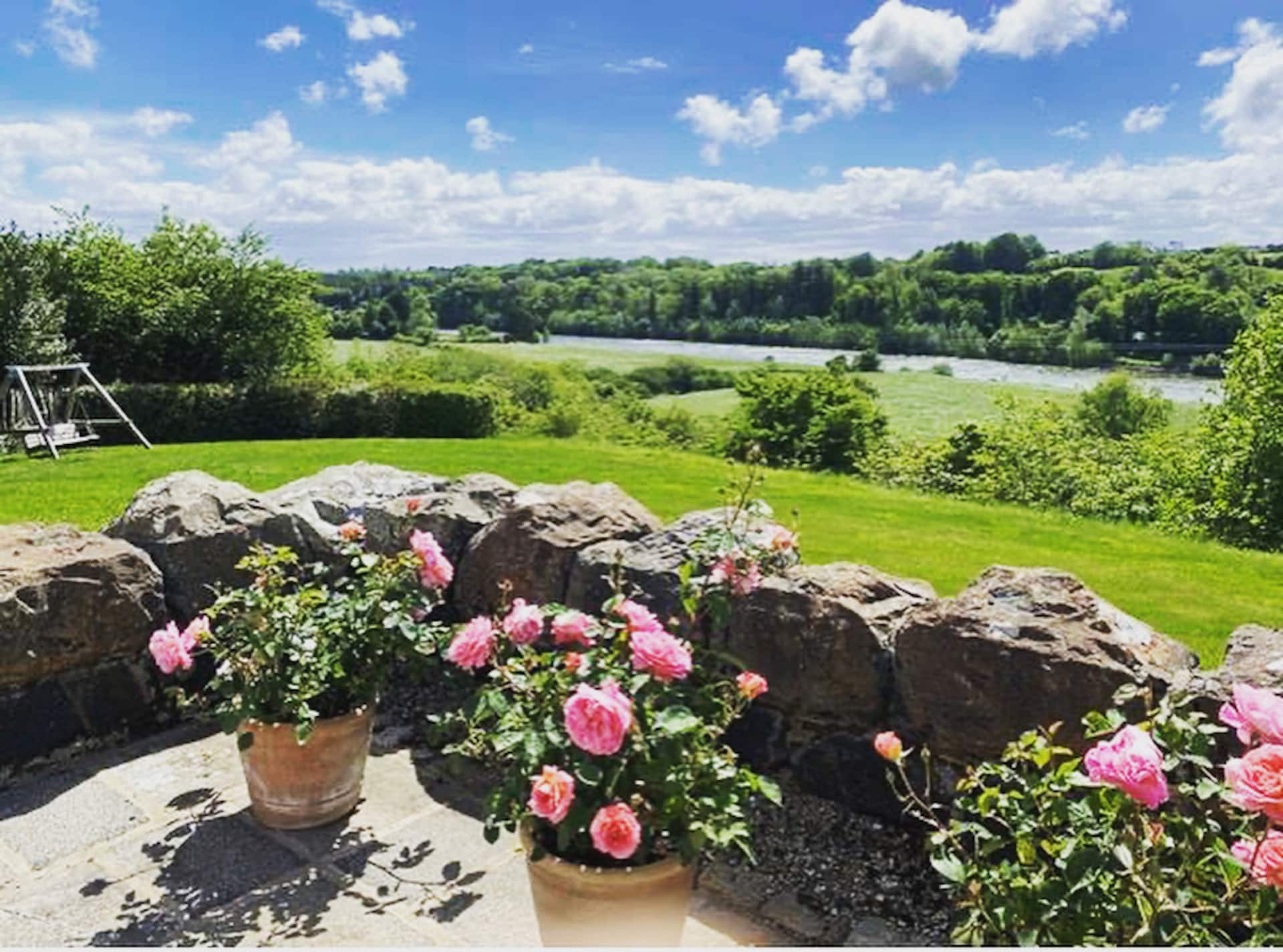 The garden at Dundarragh Lodge looking down to the River Bann